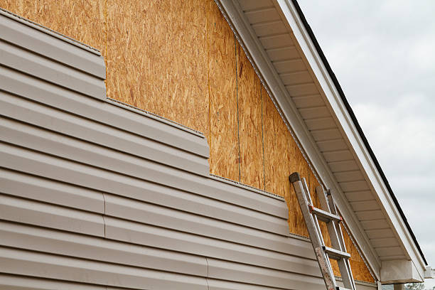 Professional Emergency Siding Repair technician working in Framingham, MA